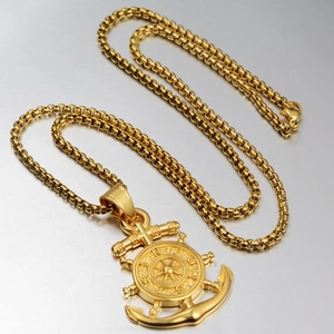 Golden nautical necklace with anchor and ship wheel pendant on a high-polish box chain