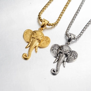 Collana con ciondolo a testa di elefante vintage in oro e argento con dettagli incisi