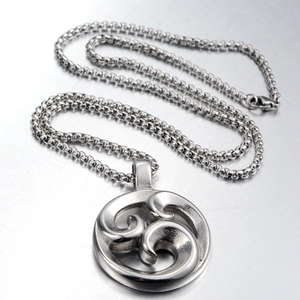 Hip hop silver stainless steel necklace with Celtic spiral round pendant on metal surface