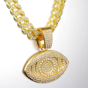 Χρυσό κολιέ hip hop Cuban link με μεγάλο μενταγιόν Evil Eye και λευκά στρας σε όλη την επιφάνεια