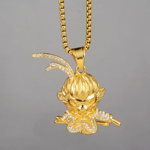 Detailed close-up of golden Sun Wukong pendant with sparkling cubic zirconia pavé setting