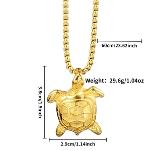 Detail view of gold turtle pendant showing 3.8x2.9cm dimensions and 60cm chain length