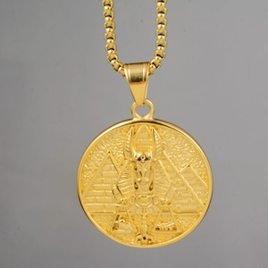 Detailed relief of Anubis and pyramids on a round gold-plated Egyptian pendant necklace