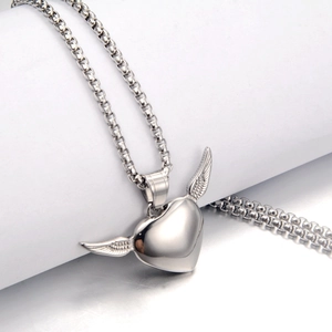 Hip hop style stainless steel necklace featuring a polished heart pendant with angel wings