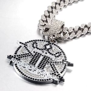 Iced-out Cuban chain necklace with King of Kings K-letter pendant and micro-pave crystals