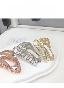 Three-color minimalist metal shark hair clips in rose gold, silver, and gold finishes