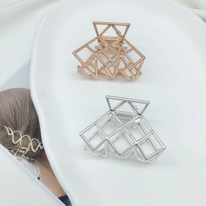Molle per capelli geometriche e cave in metallo con finiture oro rosa e argento