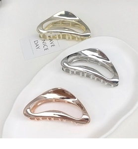 Three-piece set of geometric hollow metal hair claws in gold, silver, and rose gold finish