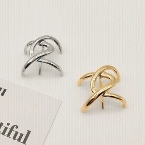 Minimalist geometric twisted metal ponytail hair hook set in polished gold and silver finishes