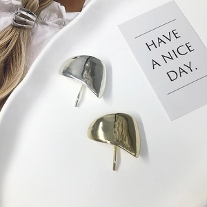 Minimalist polished gold and silver metal hair pin for stylish ponytail hair styling
