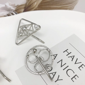 Minimalist silver metal hair clips with geometric triangle and round pearl designs