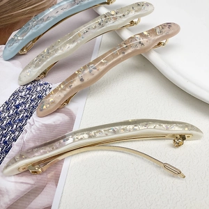 Fermagli per capelli a onde in resina acetata con glitter metallizzati e riflessi