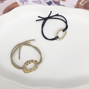 Minimalist elastic hair ties with acetate oval rings in black and marble patterns