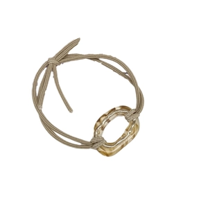 Elastic hair tie with amber acetate oval buckle and braided khaki cord for women