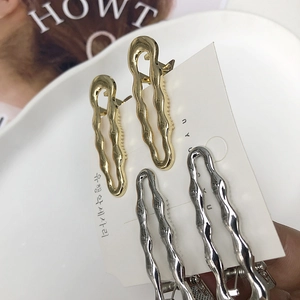 Set di fermagli per capelli minimalisti con design ondulato in oro e argento
