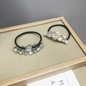Elastici per capelli con cristalli sfaccettati in finiture oro e argento