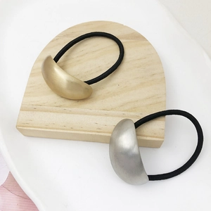 Minimalist gold and silver semicircular metal hair ties with high elastic black bands