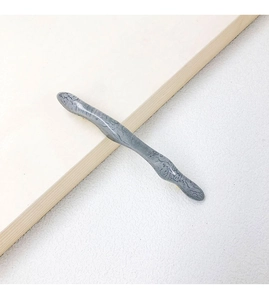 Close-up of grey marble texture curved spring hair clip with minimalist resin finish