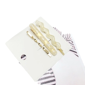 Lot de trois pinces à cheveux de style coréen en résine beige et métal doré