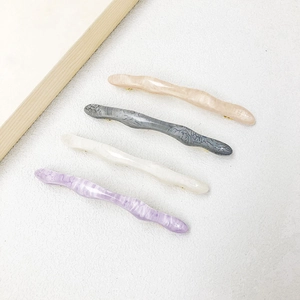 Minimalist irregular wave hair clips in four pastel marble colors for elegant styling
