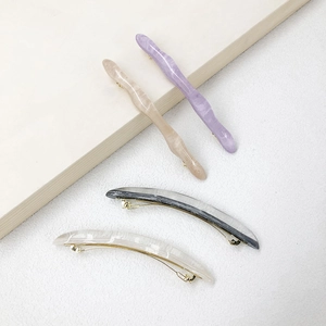 Large tortoiseshell marble hair clip set in acrylic and gold metal spring clip