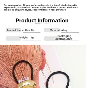Close-up of golden alloy U-shaped ponytail holder hair tie with metallic finish