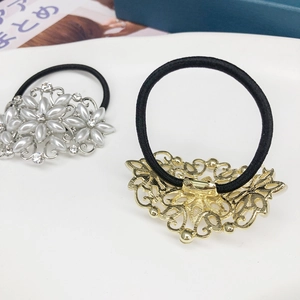 Élastiques à cheveux luxueux avec fleurs en perles et strass sur bandes noires élégantes