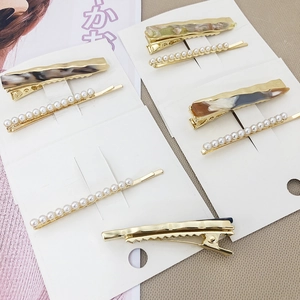 Ensemble élégant de pinces à cheveux en perles et marbre au design minimaliste