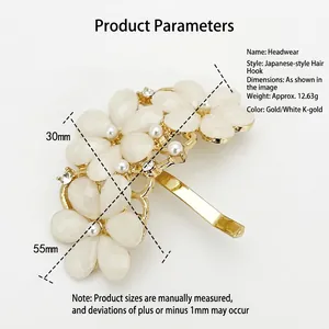 Gancio per capelli a fiore dorato con perle e cristalli, misura 55mm x 30mm