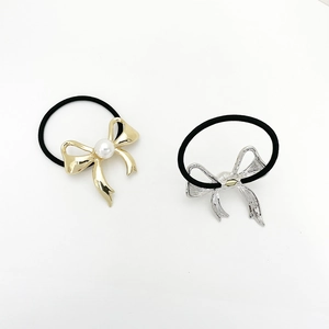 Elastic bow hair tie set with faux pearl accents in gold and silver metallic finishes
