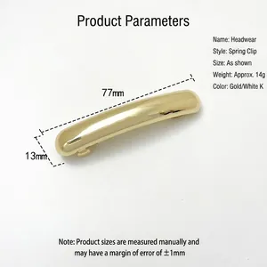 Minimalist gold alloy spring hair clip with a polished finish and curved design, 77mm length
