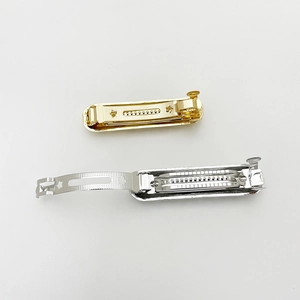Minimalist metallic star hair clips set in gold and silver with anti-slip texture