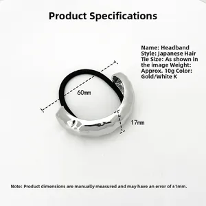 Detail showing 60mm diameter hair tie with 17mm hammered metal U-shape buckle