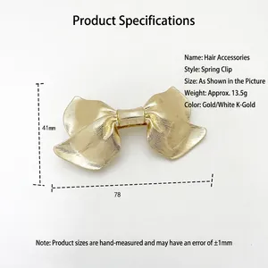Elegant gold metal bow hair clip with striped texture, 78mm spring barrette for women