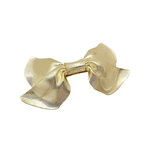 Elegant gold alloy bow hair clip with textured stripe finish for a minimalist style