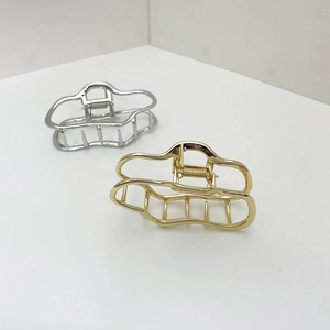 Minimalist geometric wave cloud hair claws in gold and silver plated alloy finishes