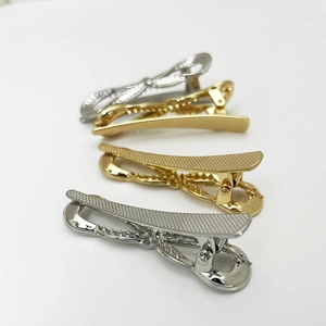 Eleganti fermagli per capelli in lega oro e argento con trama geometrica e design a becco d'oca
