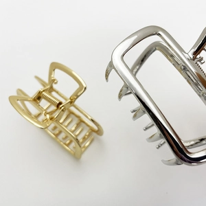 Elegant gold and silver square hollow metal hair claws for women in a minimalist style