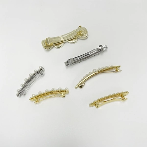 Elegant 6-piece pearl hair clip set with gold and silver spring clips for hair styling