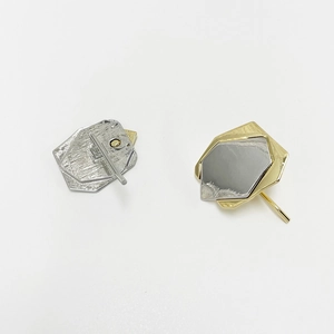 Irregular geometric layered stud earrings in gold and silver finish metallic alloy