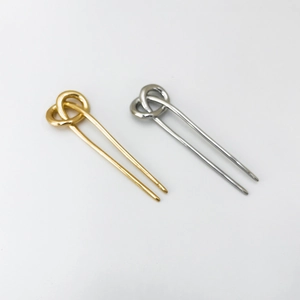 Minimalist U-shaped hair pins in gold and silver finish with elegant twisted knot design