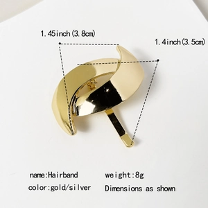 Elegant gold metal ponytail cuff with minimalist crossover design and mirror finish