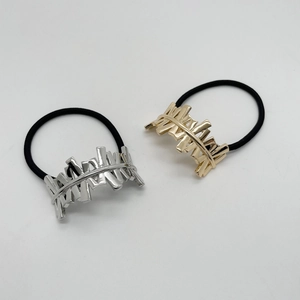 Minimalist U-shaped alloy hair ties set with gold and silver irregular geometric accents