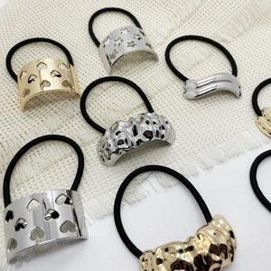 Elegant gold and silver alloy ponytail hair ties featuring star and heart hollow patterns