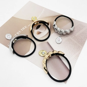 Minimalist U-shaped metal hair ties with rose charms in gold and silver finish