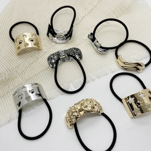 Elegant 8-piece alloy ponytail holder set in gold and silver with various geometric charms
