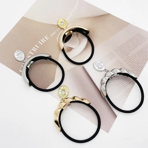 Minimalist U-shaped metal ponytail holders with gemstones in gold and silver finishes