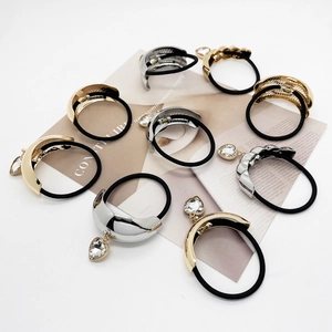Minimalist U-shaped alloy hair ties with heart pendants in gold and silver finish
