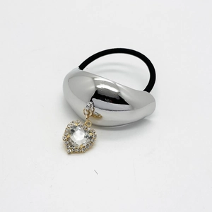 Detail of Korean style elastic hair tie with silver curved metal and heart rhinestone charm