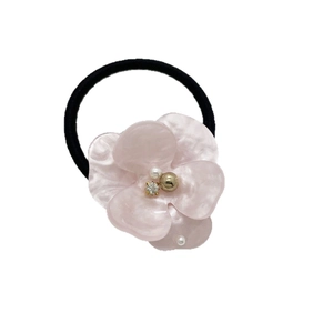 Pink resin flower hair tie with pearl accents on black elastic band for women